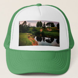 Boné Um banco, com árvores refletoras