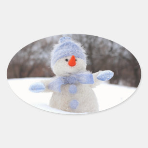 Boneco de neve adorável com etiqueta azul do Nata