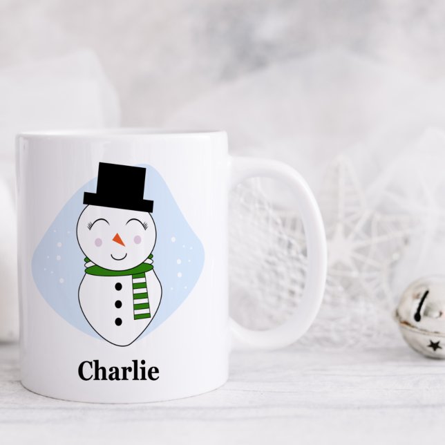 Bonito boneco de neve com caneca de Natal verde (Criador carregado)