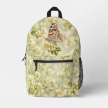 Borboleta Painted Lady em Flores Brancas