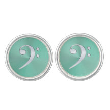 Clef baixo da música de prata na luz - botão de