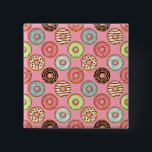 Bóton Quadrado 5.08cm Colorful Donut Pattern Cute Sweet Treats<br><div class="desc">Express your love for sweets with this cute donut pattern button pin. This small but eye-catching accessory features a detailed illustration of colorful glazed doughnuts and sprinkles on a pink background. It is a perfect way to personalize your denim jacket, backpack, or hat with a touch of kawaii flair. These...</div>
