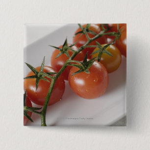 Bóton Quadrado 5.08cm Fim-acima dos tomates em uma bandeja