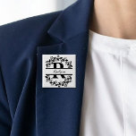 Bóton Quadrado 5.08cm Modern Black Floral Wreath Split Monogram "R"<br><div class="desc">This refined floral split monogram wreath design features a delicate botanical arrangement forming a graceful circular frame around a customizable monogram "R". The balanced composition highlights elegant leaves and floral accents that create a timeless and sophisticated look. Perfect for personalized gifts, and accessories, this design blends classic monogram style with...</div>