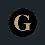 Bóton Redondo 2.54cm Personalidade Moderna Simples, Preto e bege Inicia<br><div class="desc">Um simples design moderno com uma letra / monograma inicial bege em negrito sobre fundo preto.</div>