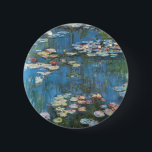 Bóton Redondo 5.08cm Lírios de Claude Monet, Impressionismo venenoso<br><div class="desc">Waterlily (1914), de Claude Monet, é uma pintura impressionista de arte natural. Uma das muitas variações das pinturas florais de lírio-d'água que Monet pintou pelo lago em seu jardim floral em Giverny, França. Sobre o artista: Claude Monet (1840-1926) foi o fundador do movimento de pintura impressionista francês, com a maioria...</div>
