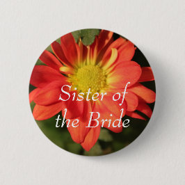 Bóton Redondo 5.08cm Ouro, flores de margarida cor laranja.