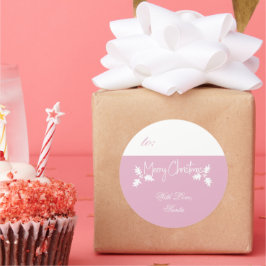 Branca e rosa, com etiqueta de presente Feliz Nata