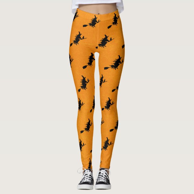 Bruxa sobre Leggings de Halloween de Broomstick (Frente)