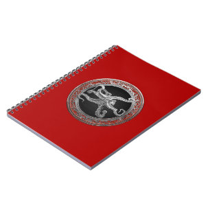 Caderno Espiral [100] Polvo prateado sagrado em postura defensiva