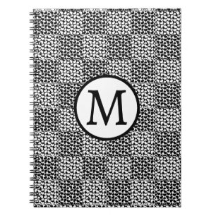 Caderno Espiral Amor marcado em preto e branco