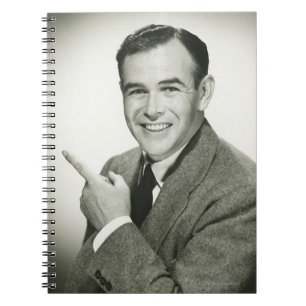 Caderno Espiral Apontar do homem de negócios