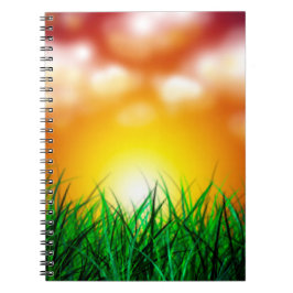 Caderno Espiral Belo nascer do sol sobre um campo de grama