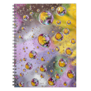 Caderno Espiral Bolhas abstratas com flores. Crédito: Nancy