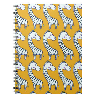 Caderno Espiral Cartoon zebras: padrão de fundo amarelo.