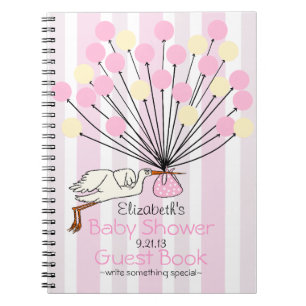 Caderno Espiral Cegonha cor-de-rosa com o livro de convidado do