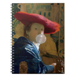 Caderno Espiral Chiclete Diva com um chapéu vermelho soprando uma 