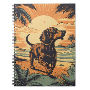 Caderno Espiral Dachshund em uma praia tropical durante o pôr do s