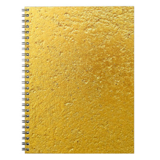 Caderno Espiral Dourado ou folha de fundo e textureabstrato