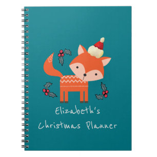 Caderno Espiral Fox alaranjado nos planos do Natal do chapéu do