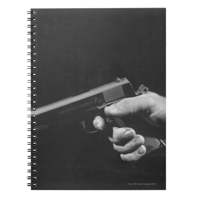 Caderno Espiral Homem que guardara a arma (Frente)