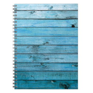 Caderno Espiral Madeira azul natural, fundo texturizado.
