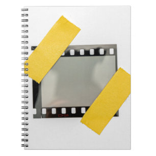 Caderno Espiral Moldura de filme de 35 mm vazia, tiras amarelas.