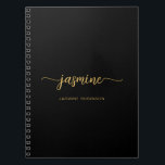 Caderno Espiral Monograma de Nome em Script Moderno Feminino Preto<br><div class="desc">Caderno espiral com monograma moderno e simples em preto e dourado, com letra feminina e script. Este design minimalista de cor simples apresenta seu primeiro nome em uma linda tipografia de letra manuscrita com cauda swash, com modelo de nome completo e fácil de personalizar. Ótimo presente personalizado feminino para festa...</div>
