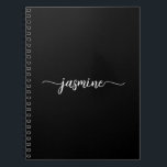 Caderno Espiral Nome de monograma de letra moderna preta feminina<br><div class="desc">Caderno espiral de letra moderna simples e feminina com monograma preto. Este design minimalista de cor simples apresenta seu primeiro nome em uma linda tipografia de letra manuscrita com rabiscos brancos sobre um fundo preto e é fácil de personalizar. Ótimo presente personalizado feminino para festa de aniversário, festa de 16...</div>