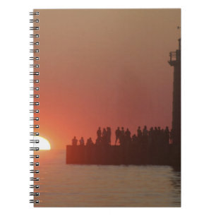 Caderno Espiral Pessoas farol pôr do sol silhueta ao sul