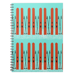 Caderno Espiral Pincéis vermelhos no notebook azul