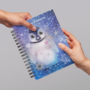 Caderno Espiral Pinguim com um notebook cardíaco