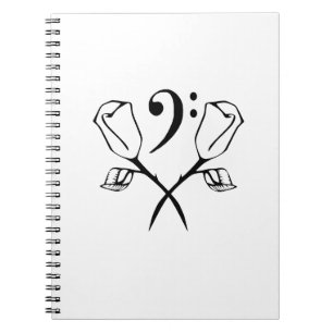 Caderno Espiral Rosa Gêmeo acima da Limpeza de Bass
