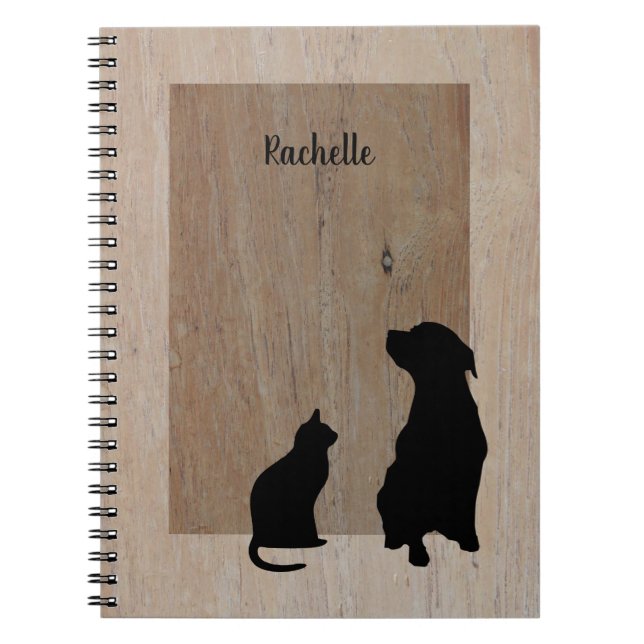Caderno Espiral Silhuetas bonitos do gato & do cão na madeira (Frente)