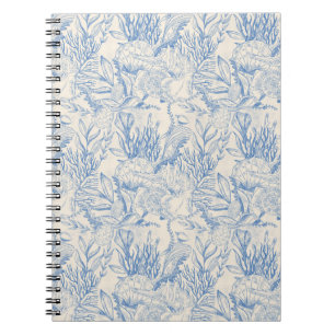 Caderno Espiral sobre um fundo branco, tema marinho e azul