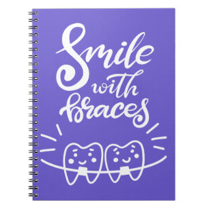 Caderno Espiral Sorriso com os dentes de sorriso das cintas