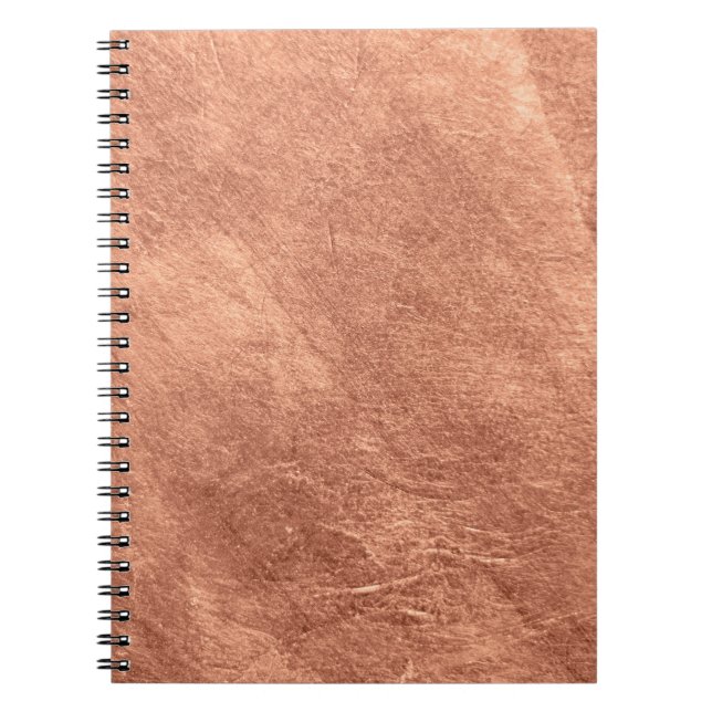 Caderno Espiral Superfície de cobre escovada, textura metálica. (Frente)