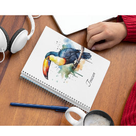 Caderno Espiral tucano colorido sentado num galho