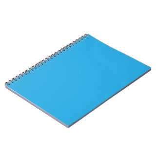 Caderno Espiral um fundo azul com um gato preto e branco