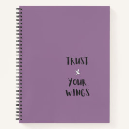 Caderno roxo com citação positiva motivacional