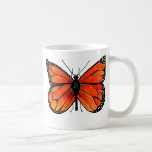 Café Borboleta de monarca na caneca do café/chá