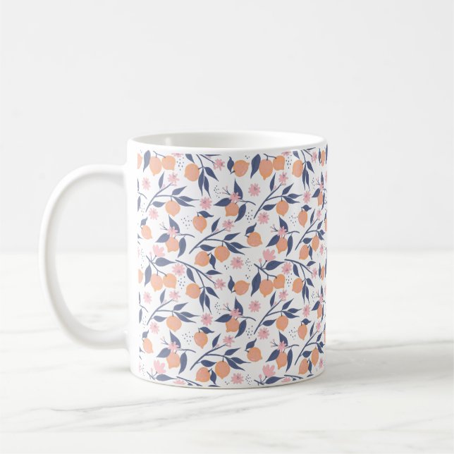 Café Caneca com padrão de folhas laranja cítricas e azu (Esquerda)