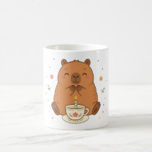 Caneca de chá com vela de aniversário de capivara