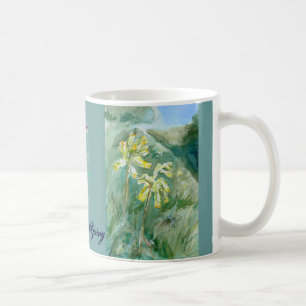 Café Caneca do primavera com os veris do Primula de