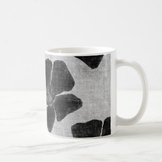 Café Caneca preta do teste padrão de flor