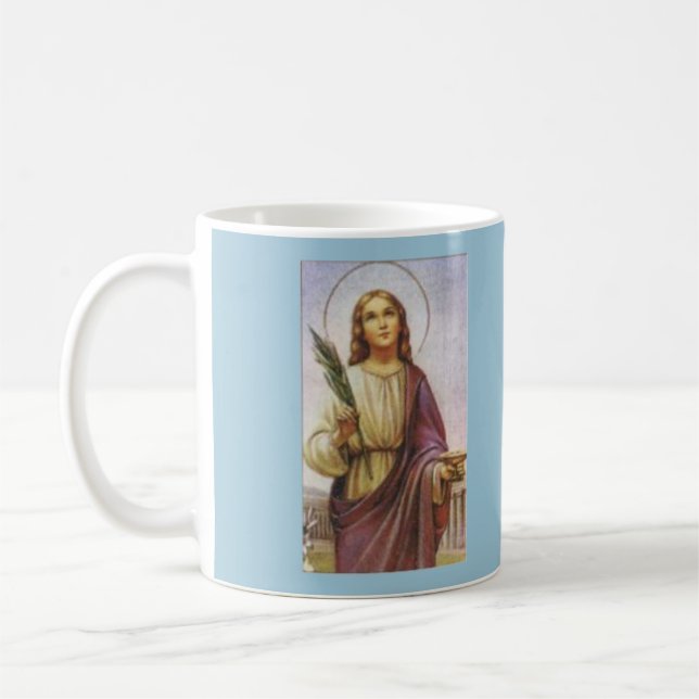 Café Consumidor de Lucy* do santo da caneca da cegueira (Esquerda)