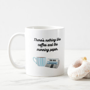 Café e uma caneca de jornal