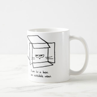 Café O gato irritado esconde em uma caixa - caneca de
