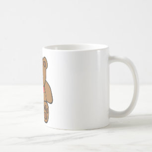 Café Urso de ursinho com uma caneca vermelha do arco