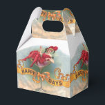 Caixinha De Lembrancinhas Mulher Vitoriana Champanhe Vermelho Feliz<br><div class="desc">Mulher Vitoriana de Vermelho Celebrando no Copo de Champanhe - "Dias Felizes" é certamente anunciado alto e claro nesta engraçada peça publicitária de charuto vintage. A pequena mulher de alguma forma acabou tomando seu coquetel enquanto sentada dentro de um copo de Champanhe bastante grande. O anúncio foi lançado em 1909...</div>